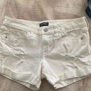 Express midi low rise white distressed shorts